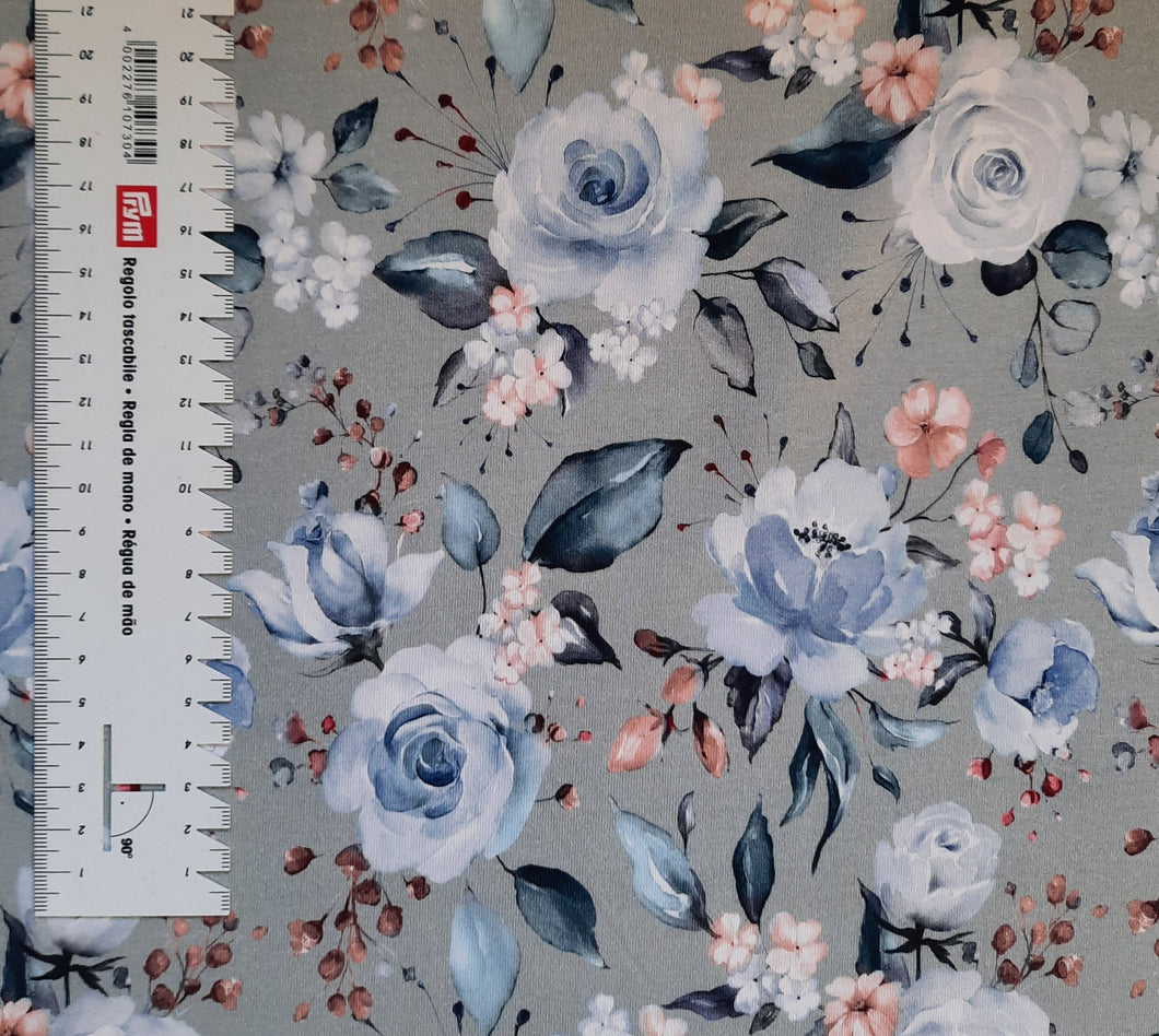 #217 fleurs bleues fond argent vendu au demi mètre Coton Lycra surplus