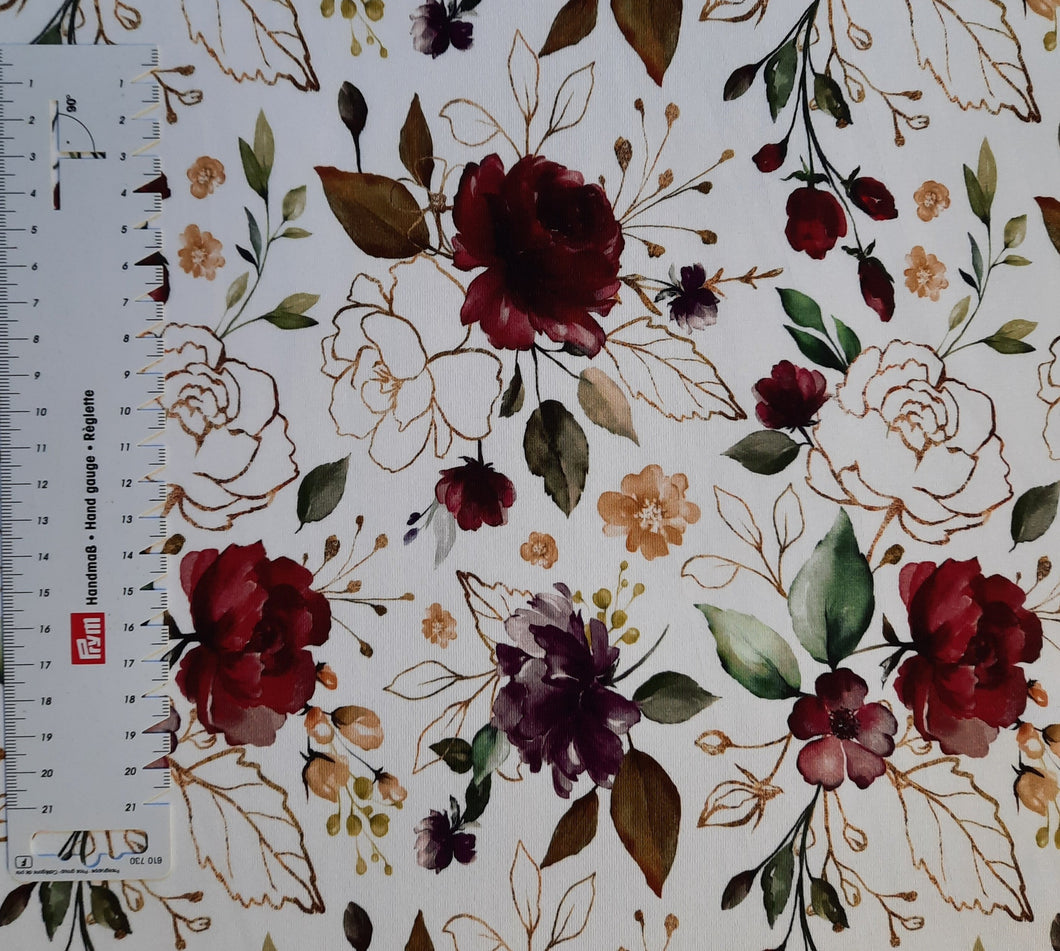 #288 floral red and gold white background sold by the half meter surplus French Terry