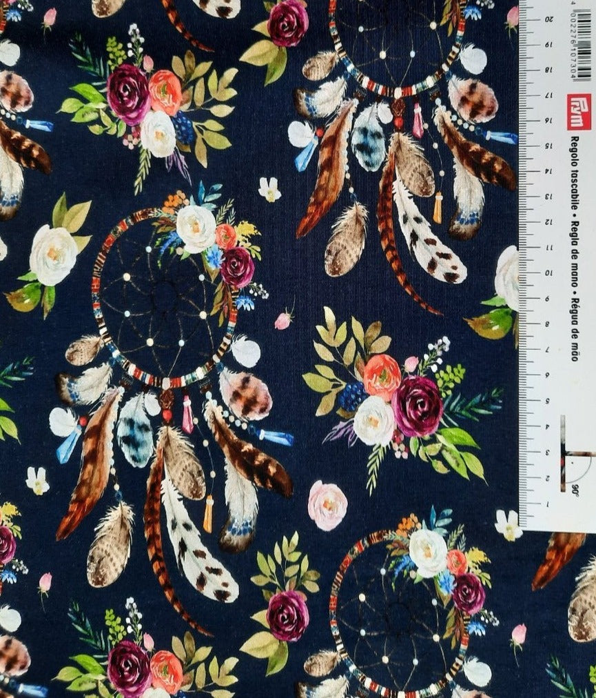 #299 flowers and dreamcatchers navy background sold by the half meter Cotton Lycra surplus