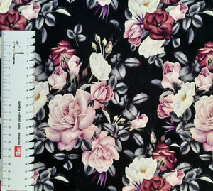 #24 fleurs fond noir vendu au demi mètre French Terry surplus