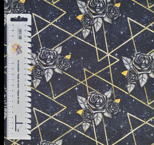 #313 fleurs et triangles fond noir vendu au demi mètre French terry surplus