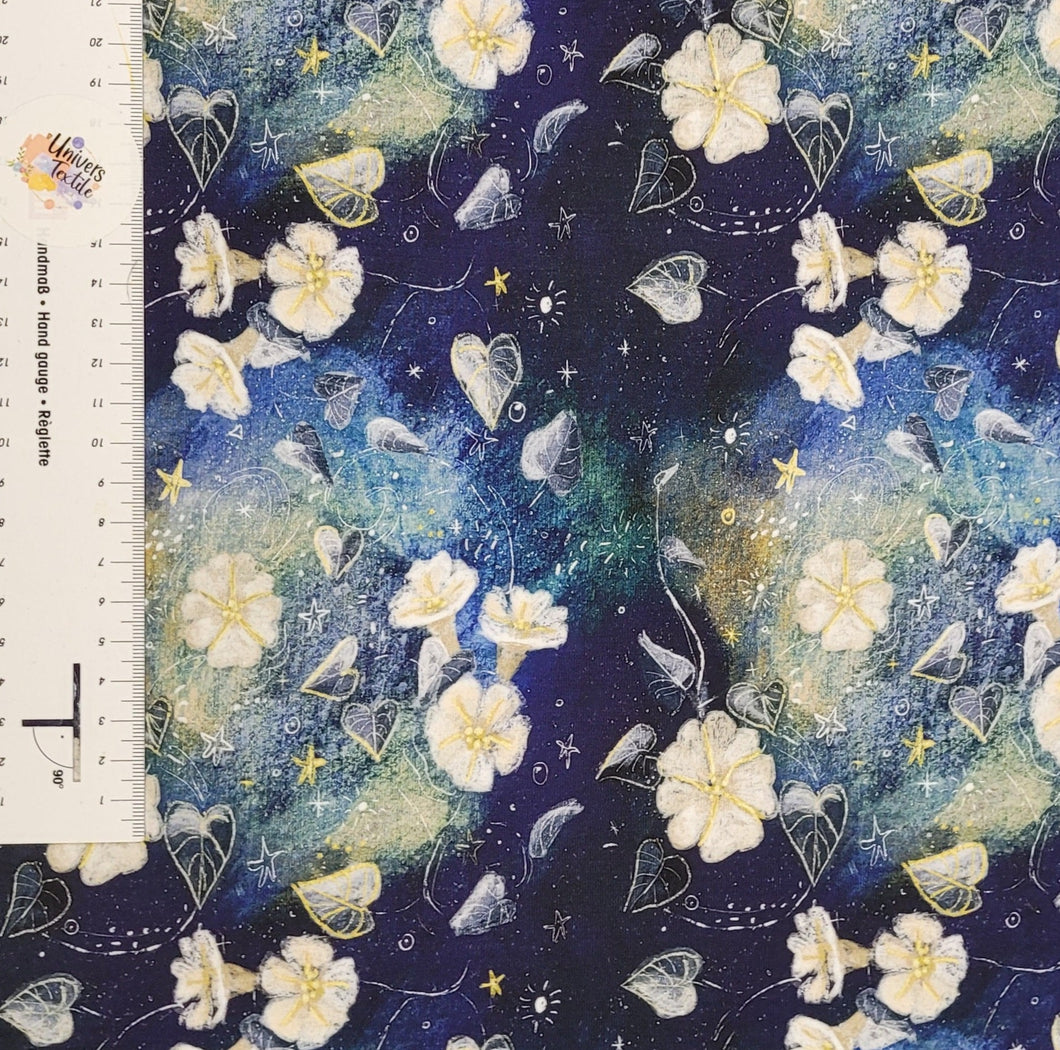 #606 fleurs dans la galaxie vendu au demi mètre Coton Lycra surplus